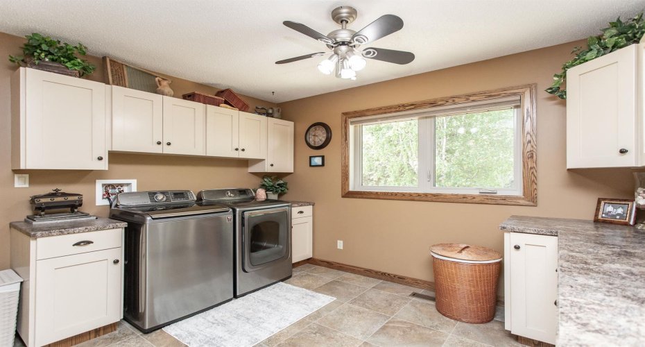 Large Laundry Room on the main level could be converted to a 4th Bedroom is desired