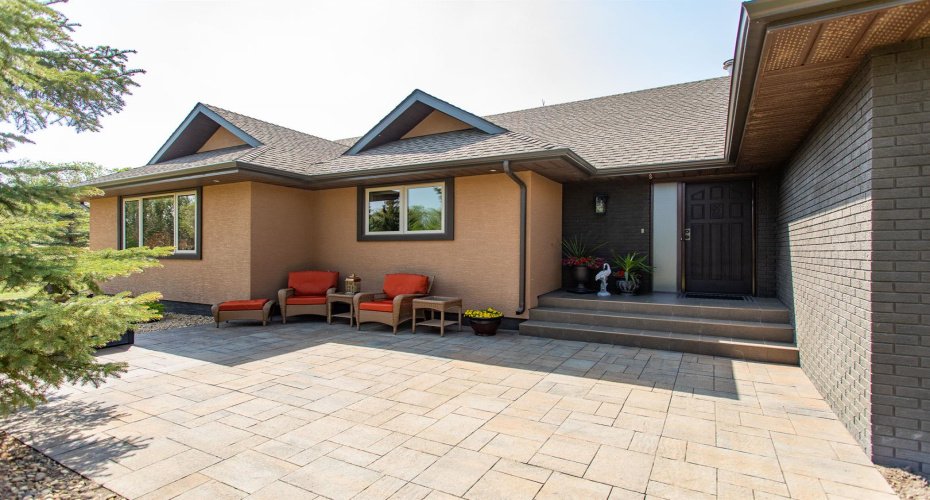 Welcoming front porch and sitting area, perfect for catching the sunrise