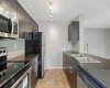 Upgraded granite countertops and newer stainless steel appliances