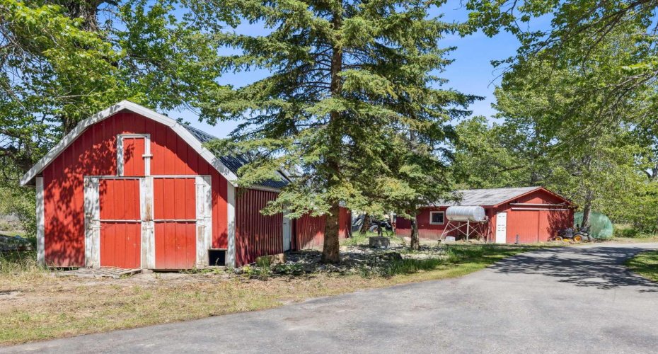 Property has a barn and large shop