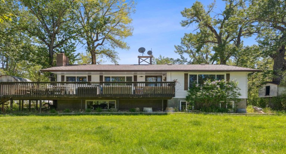 Back deck faces west towards the river