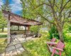Phenominal Gazebo area with Firepit & Evening Lighting