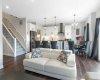 View from living room to the gorgeous gourmet kitchen & dining room