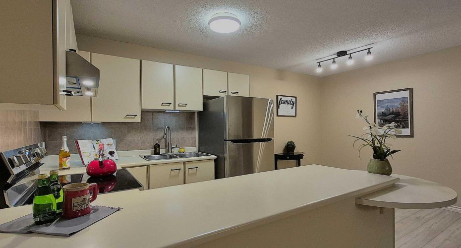 2722 EDENWOLD Heights, Calgary, Alberta T3A 3Y5, 2 Bedrooms Bedrooms, ,2 BathroomsBathrooms,Residential,For Sale,EDENWOLD,A2247296