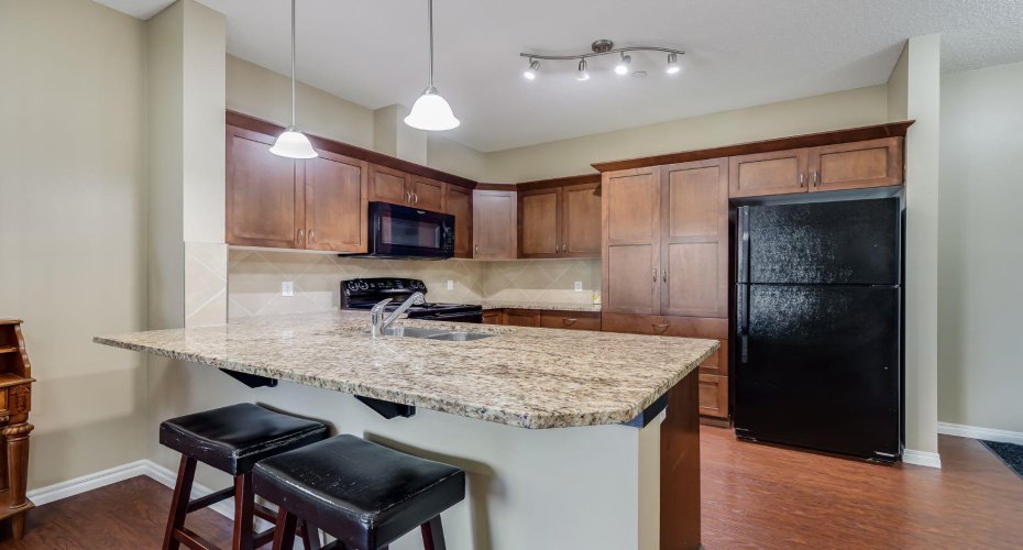 4 Kingsland Close, Airdrie, Alberta T4A 0J3, 2 Bedrooms Bedrooms, ,2 BathroomsBathrooms,Residential,For Sale,Kingsland,A2248790