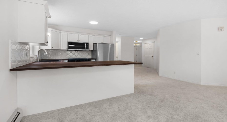 7451 Springbank Boulevard, Calgary, Alberta T3H4K5, 2 Bedrooms Bedrooms, ,2 BathroomsBathrooms,Residential,For Sale,Springbank,A2250493