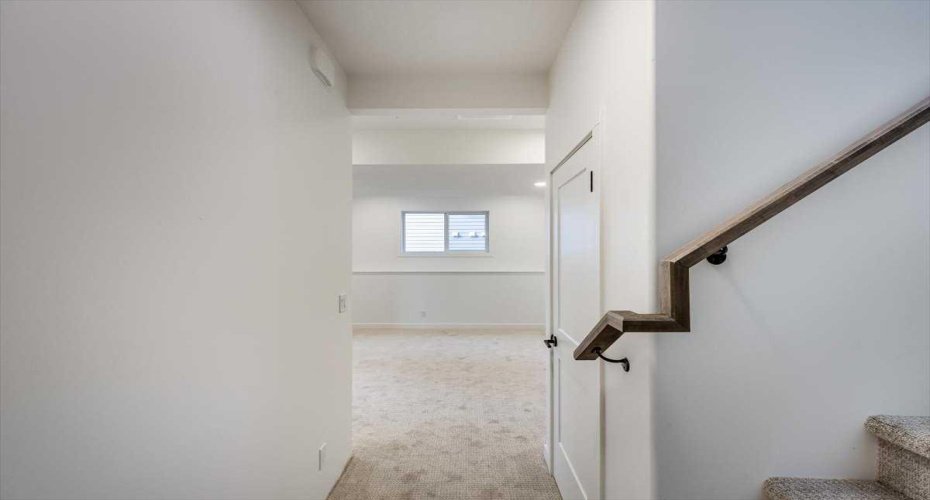 down on stairs view to family room