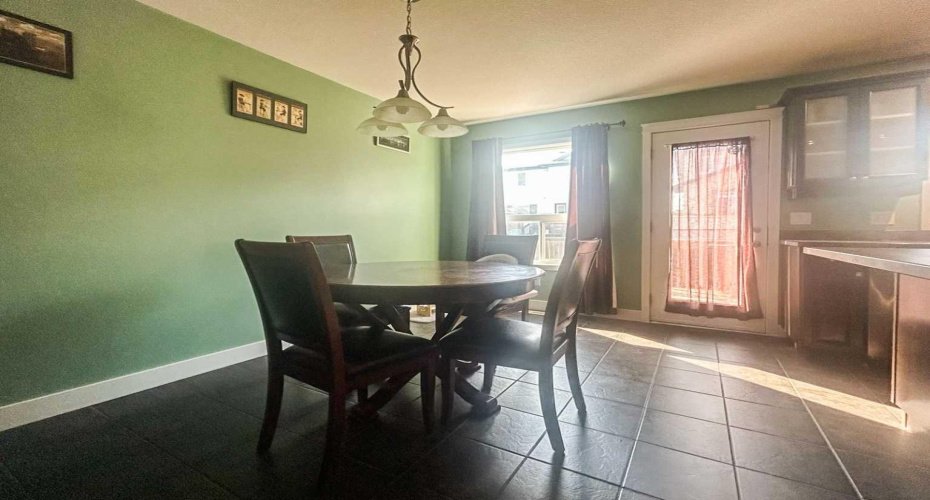 Eat in kitchen with access to backyard