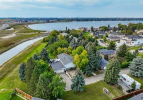 1153 East Lakeview Road, Chestermere, Alberta T1X 1B1, 5 Bedrooms Bedrooms, ,3 BathroomsBathrooms,Residential,For Sale,East Lakeview,A2257428