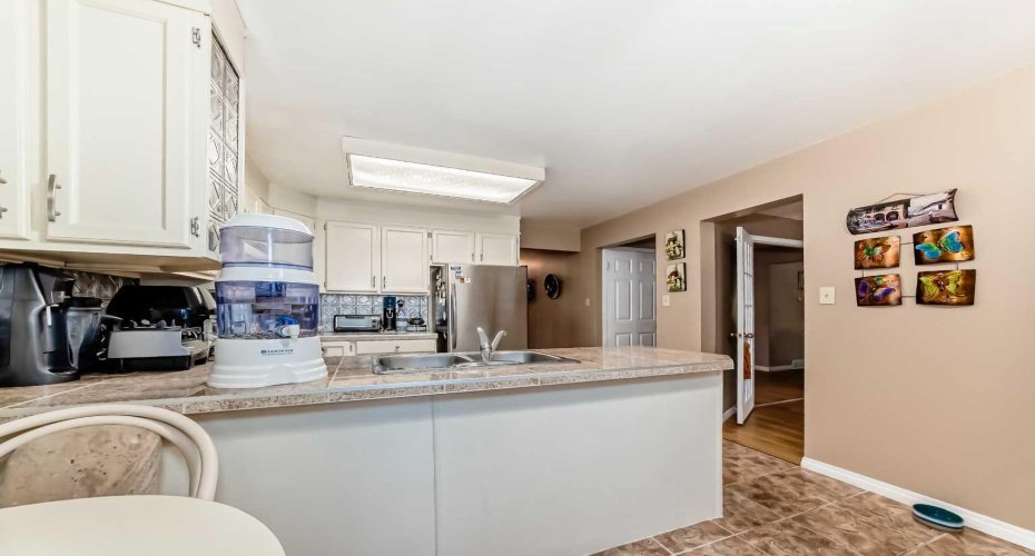 983 Woodbine Boulevard, Calgary, Alberta T2W 4A7, 4 Bedrooms Bedrooms, ,3 BathroomsBathrooms,Residential,For Sale,Woodbine,A2255928