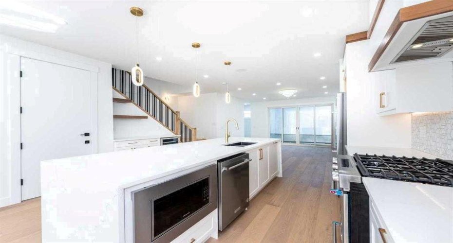 105 Hartford Road, Calgary, Alberta T2K2A7, 4 Bedrooms Bedrooms, ,4 BathroomsBathrooms,Residential,For Sale,Hartford,A2261195