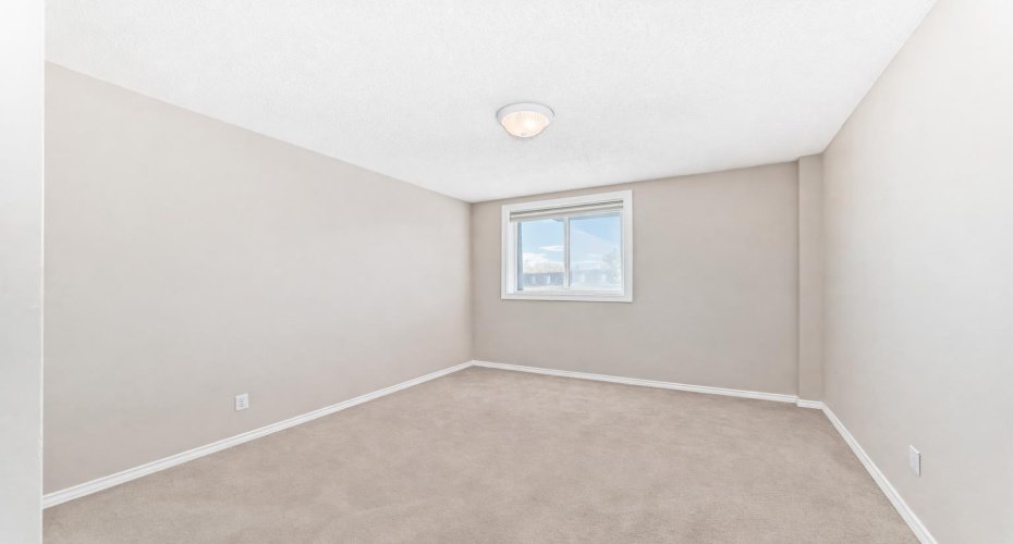 This image has been digitally cleared of furniture and decor to best illustrate layout and space. This is an image of the second bedroom.