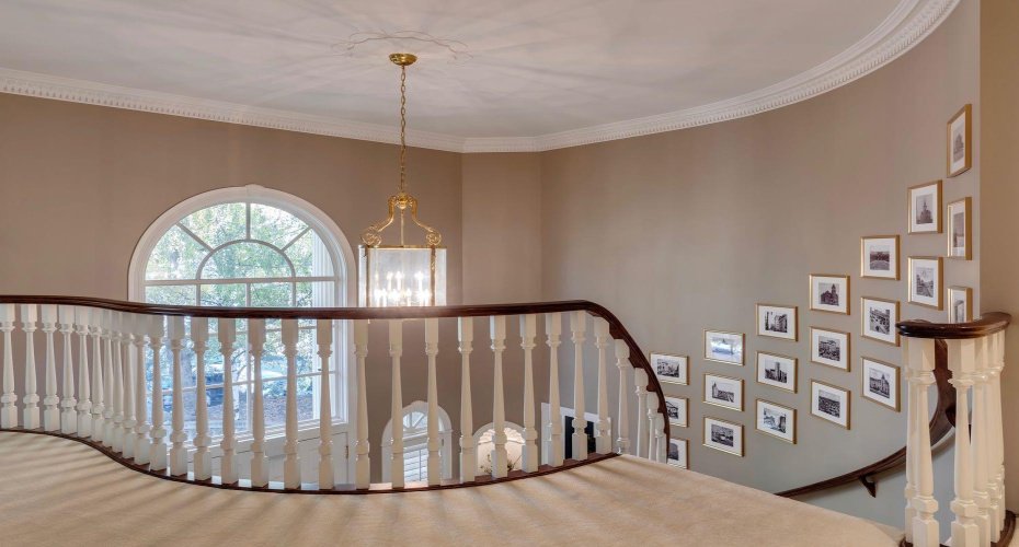 Landing at the top of the sweeping staircase