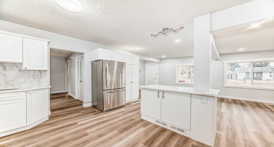 307 Huntridge Road, Calgary, Alberta T2K 4B8, 5 Bedrooms Bedrooms, ,3 BathroomsBathrooms,Residential,For Sale,Huntridge,A2272014