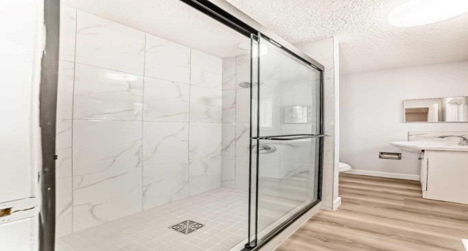 307 Huntridge Road, Calgary, Alberta T2K 4B8, 5 Bedrooms Bedrooms, ,3 BathroomsBathrooms,Residential,For Sale,Huntridge,A2272014