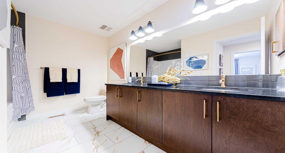 Photos are representative of the Calaria II show home in Logan Landing. Finishes may differ