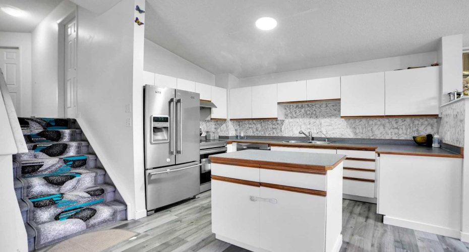 63 Martinbrook Road, Calgary, Alberta T3J3E1, 5 Bedrooms Bedrooms, ,2 BathroomsBathrooms,Residential,For Sale,Martinbrook,A2272341