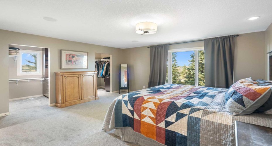 Primary suite with walk-in closets two