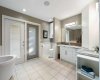 Primary ensuite with walk-through to private deck
