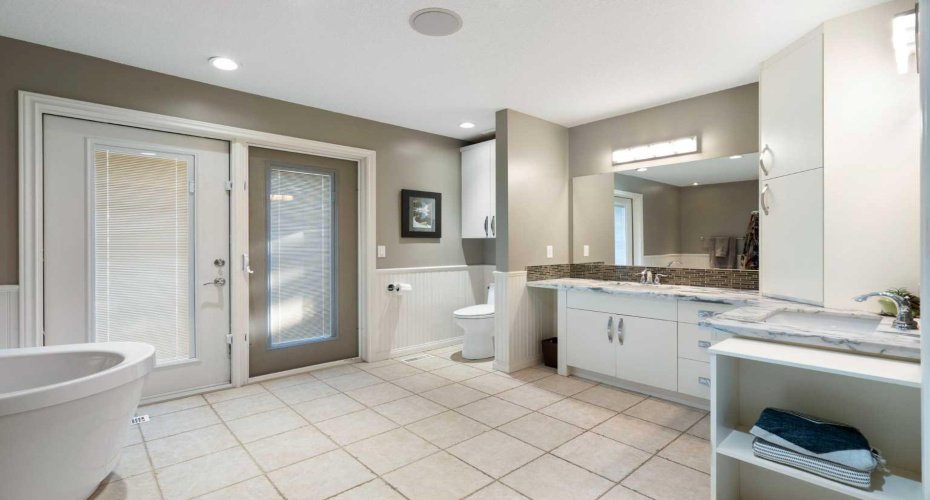 Primary ensuite with walk-through to private deck