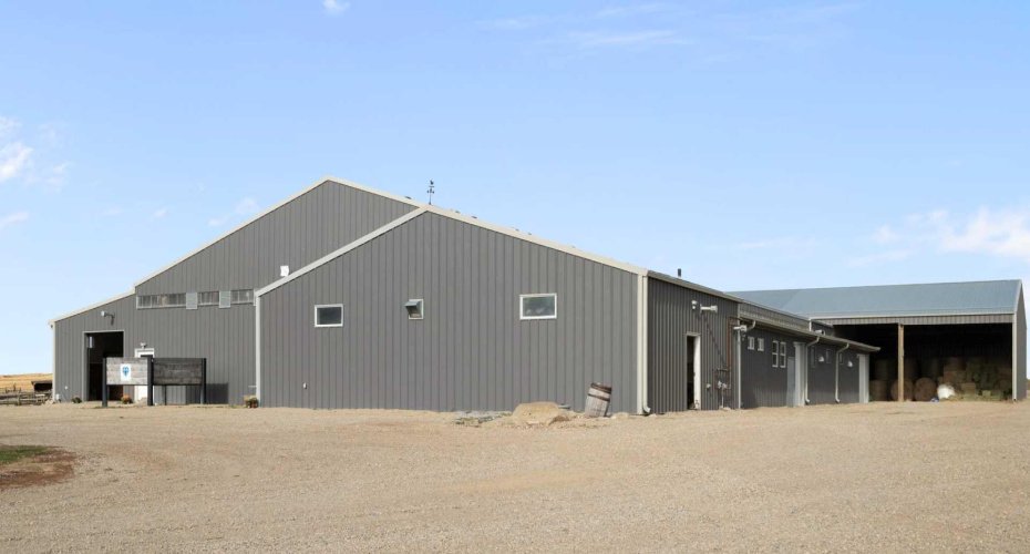 Barn with view of heated lean-to for equpment and hay storage