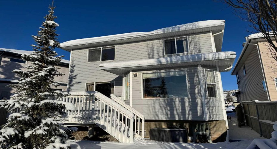 65 Spring Crescent, Calgary, Alberta T3H 3V2, 3 Bedrooms Bedrooms, ,3 BathroomsBathrooms,Residential,For Sale,Spring,A2273243