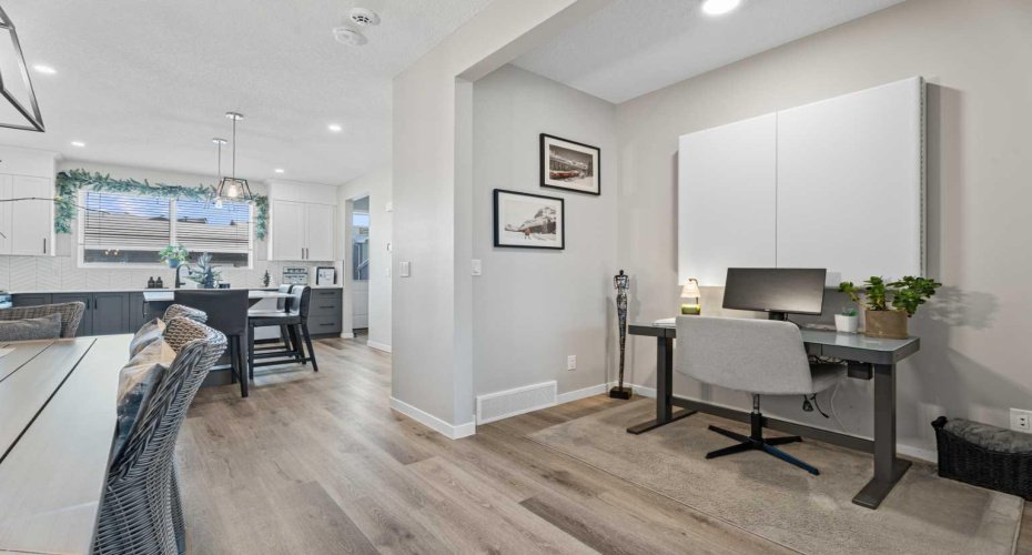 The den is perfectly suited as a dedicated office or a central home hub for day-to-day living.