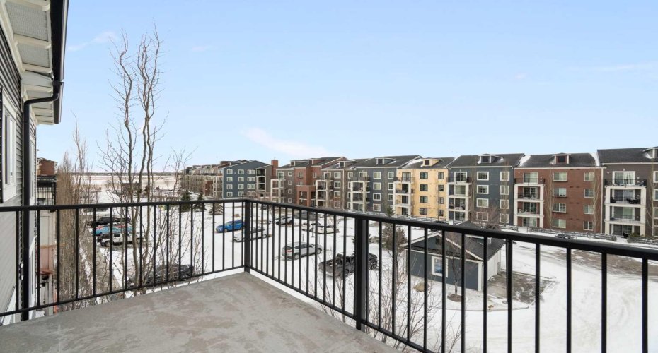 West facing balcony over looking condo courtyard