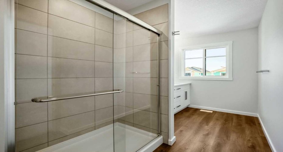 Glass door shower in ensuite