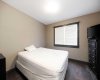 Bedroom with walk-in closet