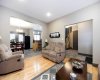 Spacious living room with view of dining room