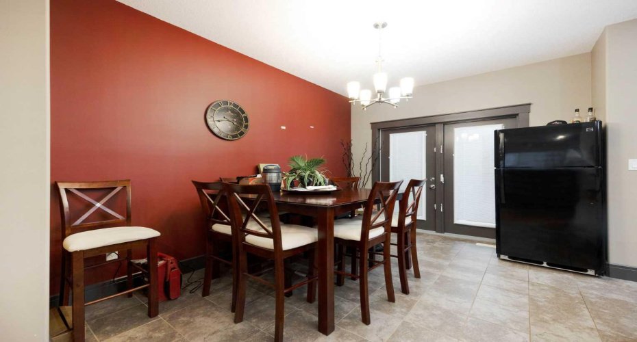 Dining room with doors to back covered deck