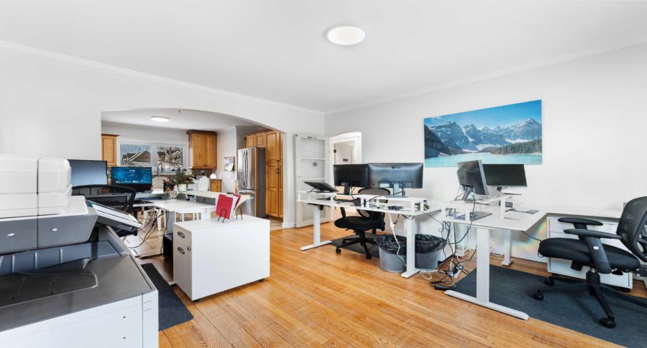 Main floor office & flex space. Opens up into a full service kitchen