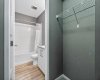 Primary Walk-Through Closet Leading to Bathroom