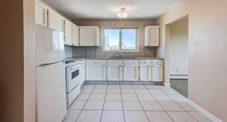1703 11 Avenue, Calgary, Alberta T3K 1J5, 2 Bedrooms Bedrooms, ,1 BathroomBathrooms,Residential,For Sale,11,A2277159