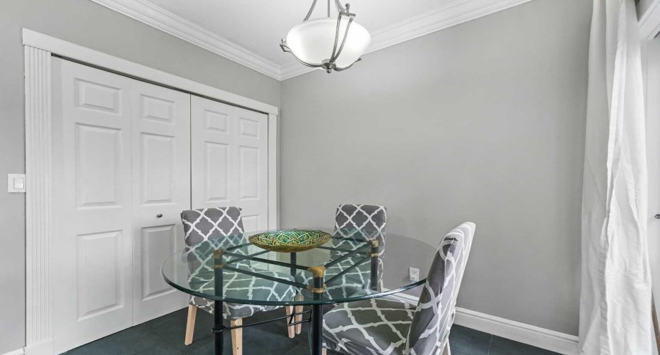 Cozy Breakfast Nook with a very conveniently tucked away Main Floor Laundry!