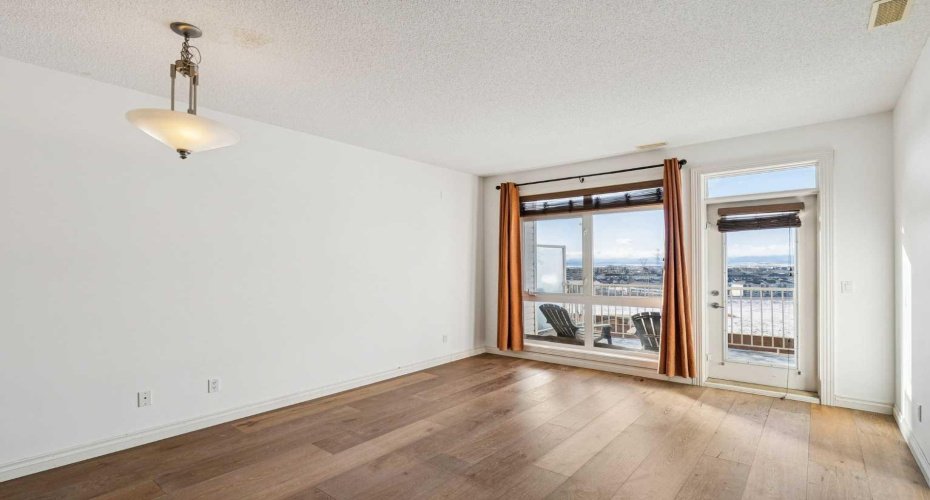 117 Rockyledge View, Calgary, Alberta T3G5X1, 2 Bedrooms Bedrooms, ,3 BathroomsBathrooms,Residential,For Sale,Rockyledge,A2278263