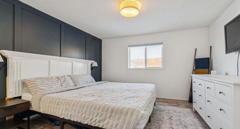 Primary Bedroom with Feature Wall