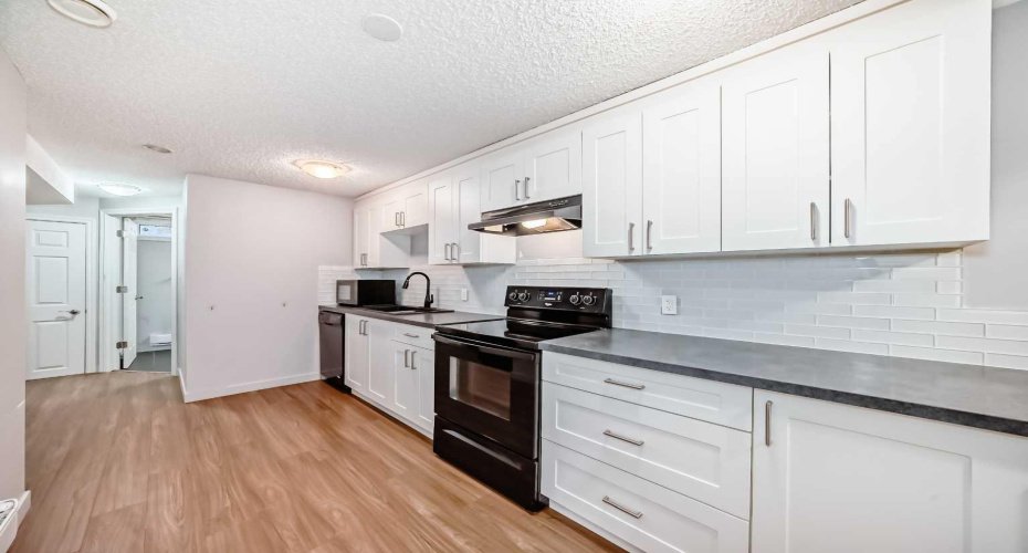 611 Meota Road, Calgary, Alberta T2E 5W8, 5 Bedrooms Bedrooms, ,2 BathroomsBathrooms,Residential,For Sale,Meota,A2278952