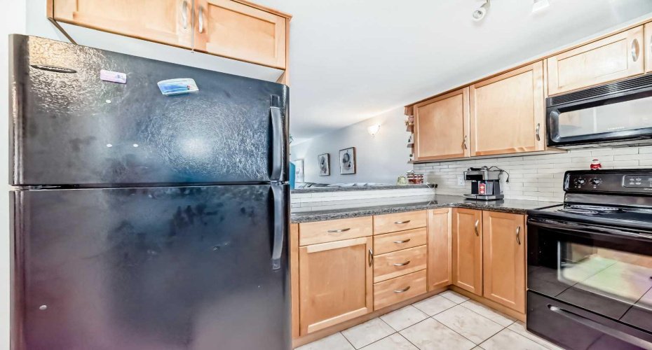 66 Glamis Green, Calgary, Alberta T3E6V1, 2 Bedrooms Bedrooms, ,2 BathroomsBathrooms,Residential,For Sale,Glamis,A2277972