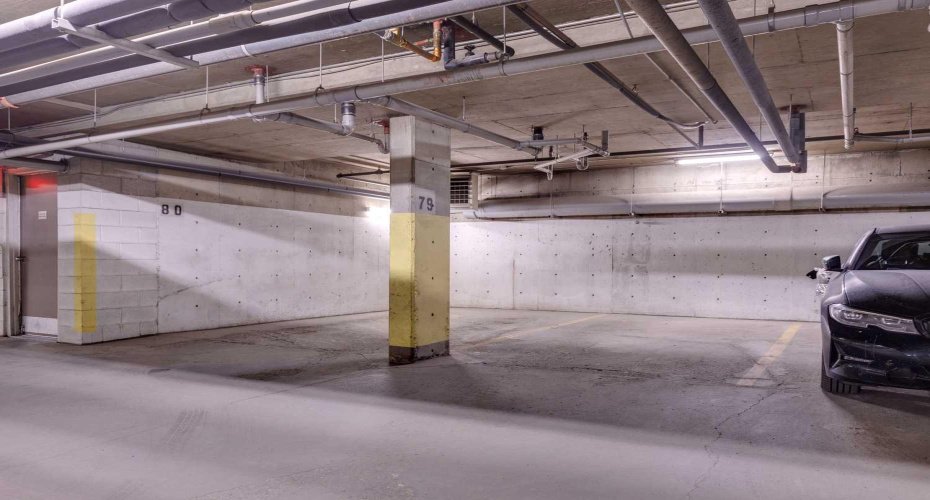 2 TITLED PARKING STALLS-SIDE BY SIDE