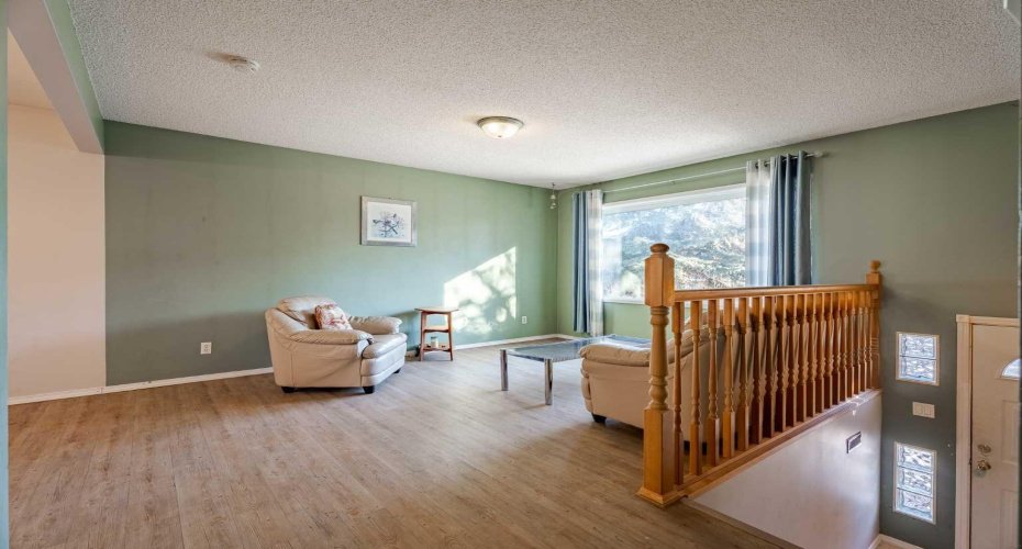 Bright east facing living room with high quality LVP flooring