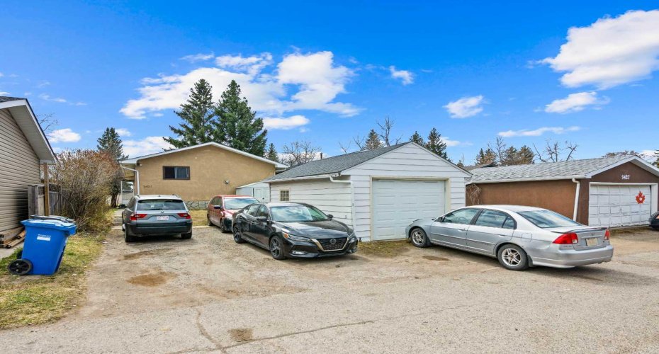Garage With Newer Roof & OH Door