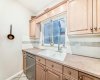 Bright, well-appointed kitchen with ample counter space and a thoughtful layout — ideal for everyday cooking and entertaining.