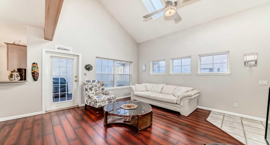 Bright and inviting living room with plenty of natural light — perfect for relaxing or entertaining.
