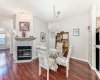 Inviting dining area accented by a cozy fireplace — a warm and welcoming space for meals and conversations.