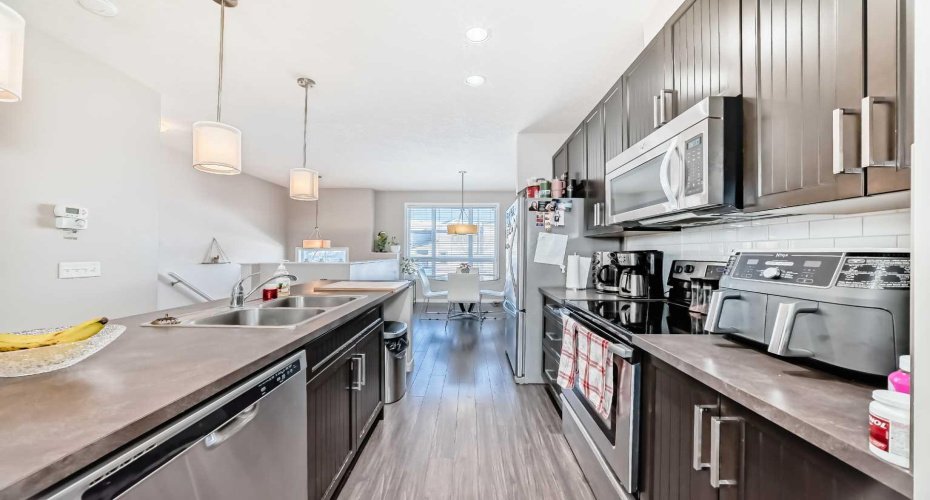 656 Copperpond Boulevard, Calgary, Alberta T2Z 5B9, 2 Bedrooms Bedrooms, ,3 BathroomsBathrooms,Residential,For Sale,Copperpond,A2282104