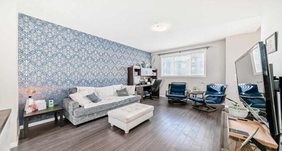 656 Copperpond Boulevard, Calgary, Alberta T2Z 5B9, 2 Bedrooms Bedrooms, ,3 BathroomsBathrooms,Residential,For Sale,Copperpond,A2282104