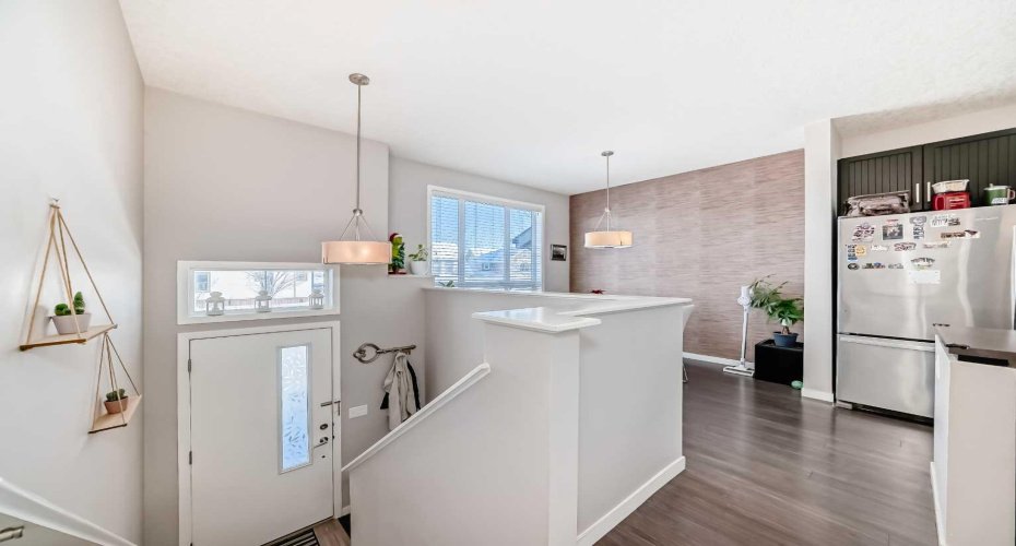 656 Copperpond Boulevard, Calgary, Alberta T2Z 5B9, 2 Bedrooms Bedrooms, ,3 BathroomsBathrooms,Residential,For Sale,Copperpond,A2282104