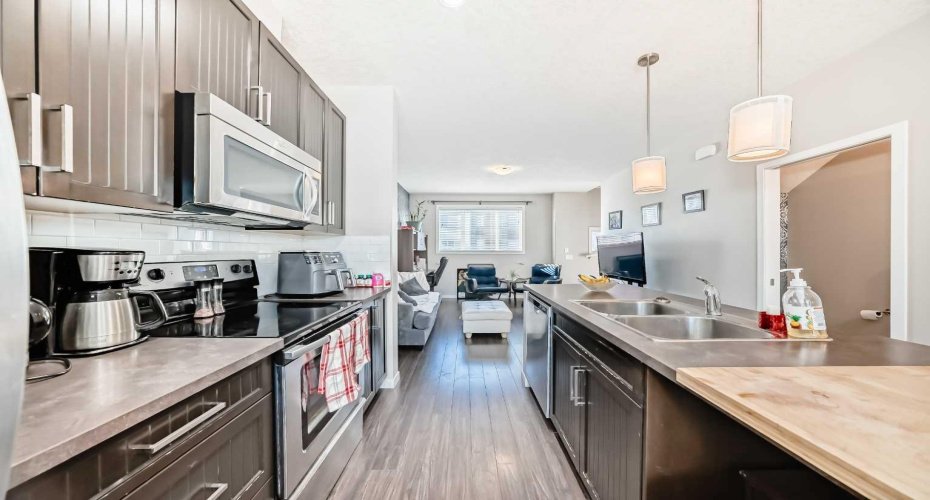 656 Copperpond Boulevard, Calgary, Alberta T2Z 5B9, 2 Bedrooms Bedrooms, ,3 BathroomsBathrooms,Residential,For Sale,Copperpond,A2282104